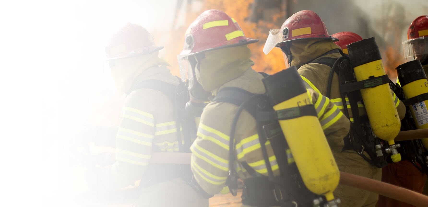 firefighters-breaching-building